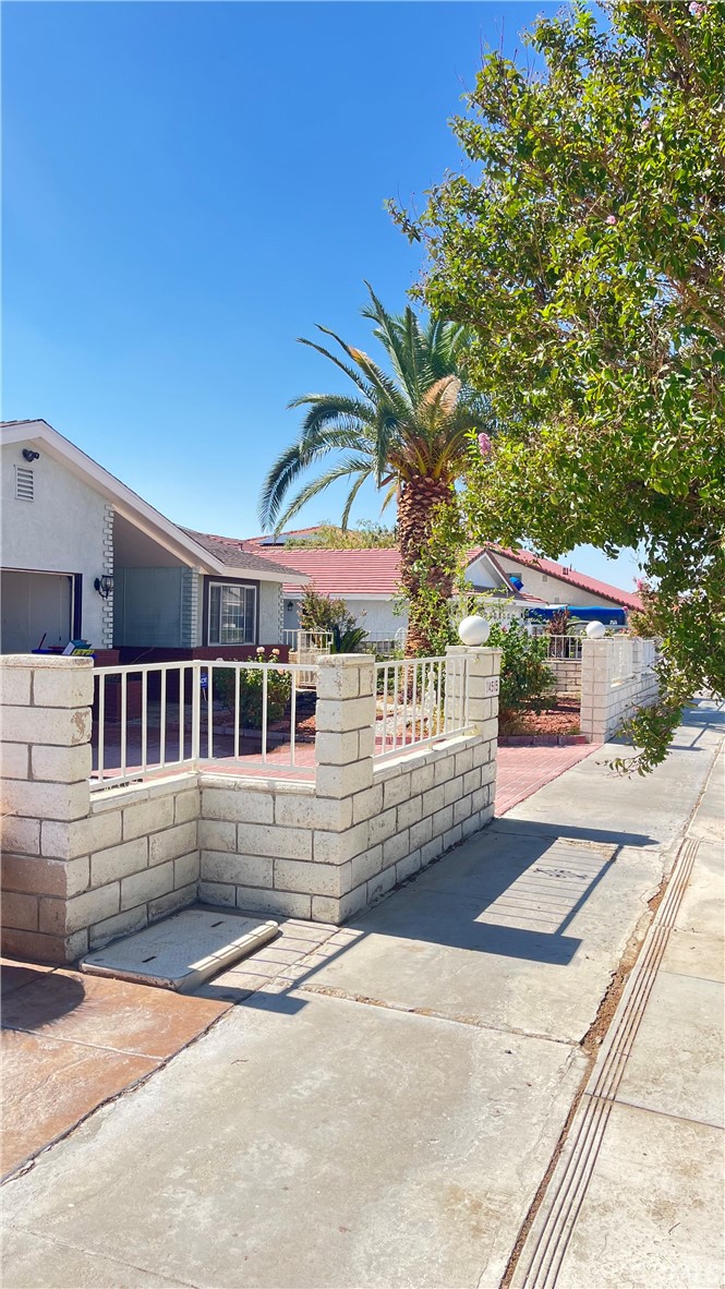 14515 Rivers Edge Road Helendale, CA 92342 - Photo 5 of 24 a view of a house with a yard