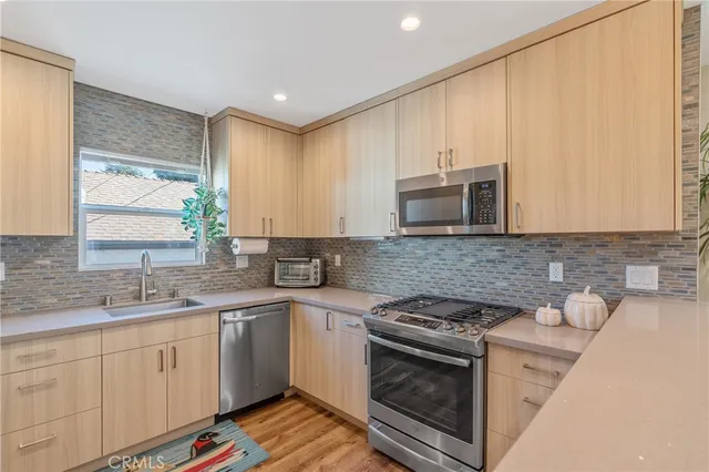 a spacious bedroom with a bed and a couch