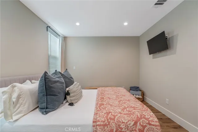 a bathroom that has a glass shower door