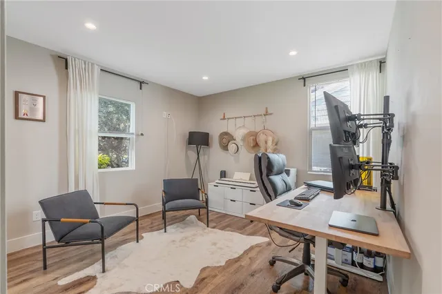 a view of a workspace with furniture