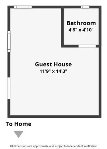 a view of a hallway with furniture