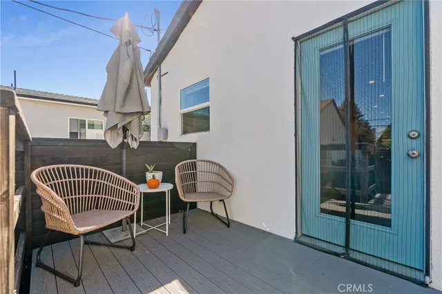 a view of a grassy field with trees