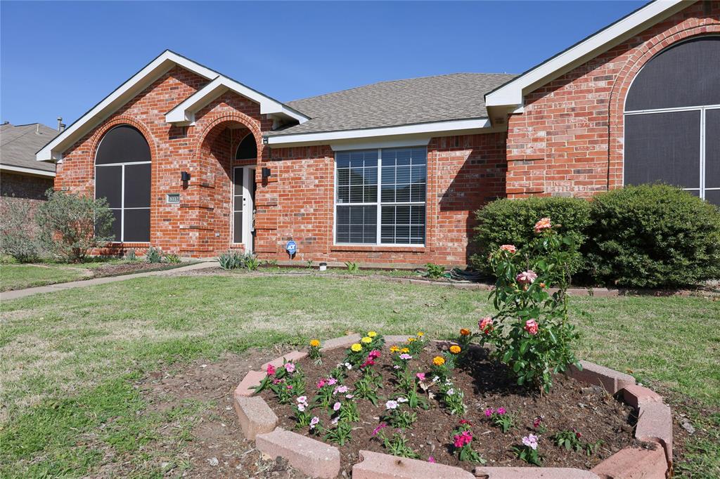 8112 Dock Street Frisco, TX 75035 - Photo 4 of 34 a front view of a house with a yard