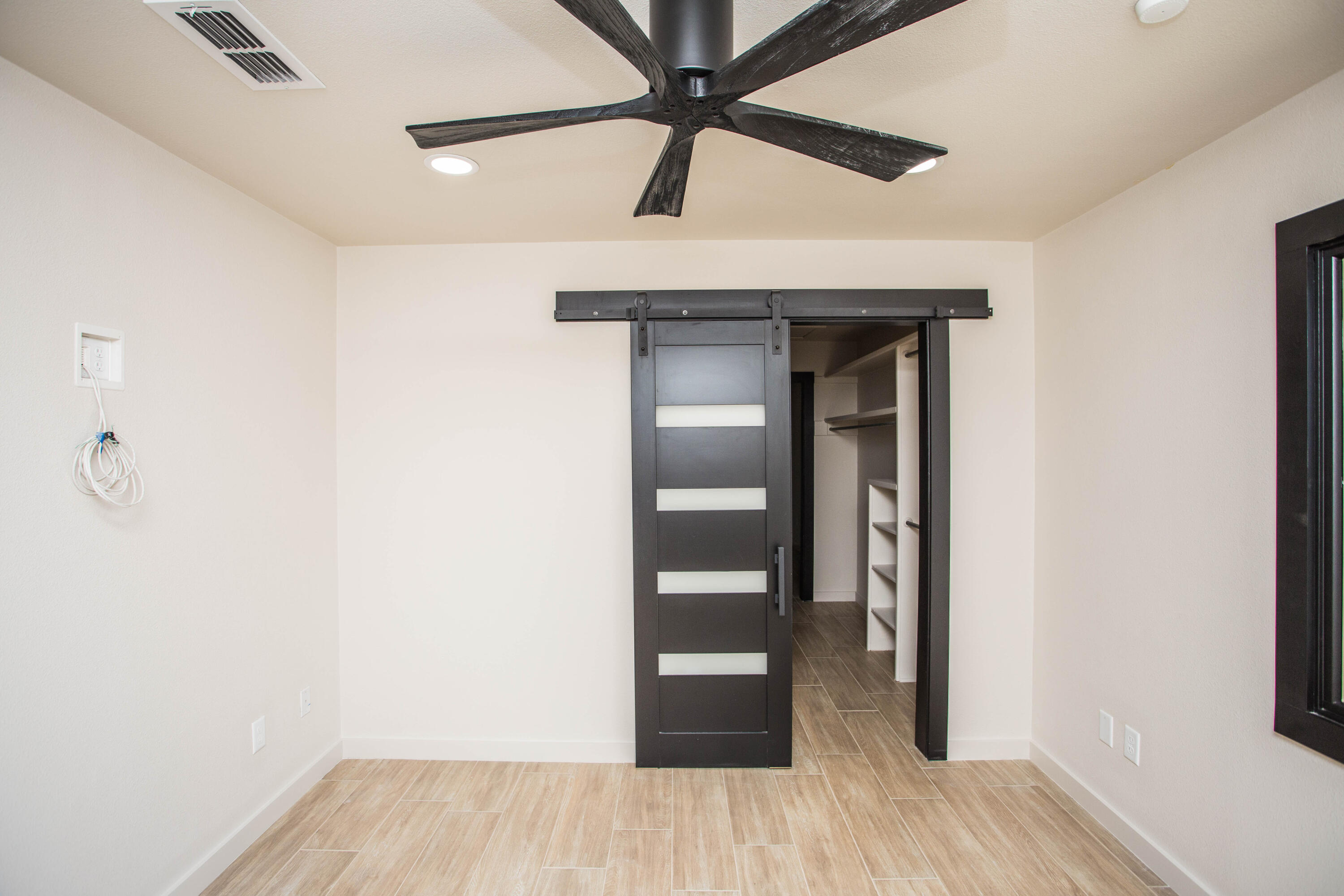 25 East Lakeshore Drive Ransom Canyon, TX 79366 - Photo 29 of 63 a view of hallway with wooden floor