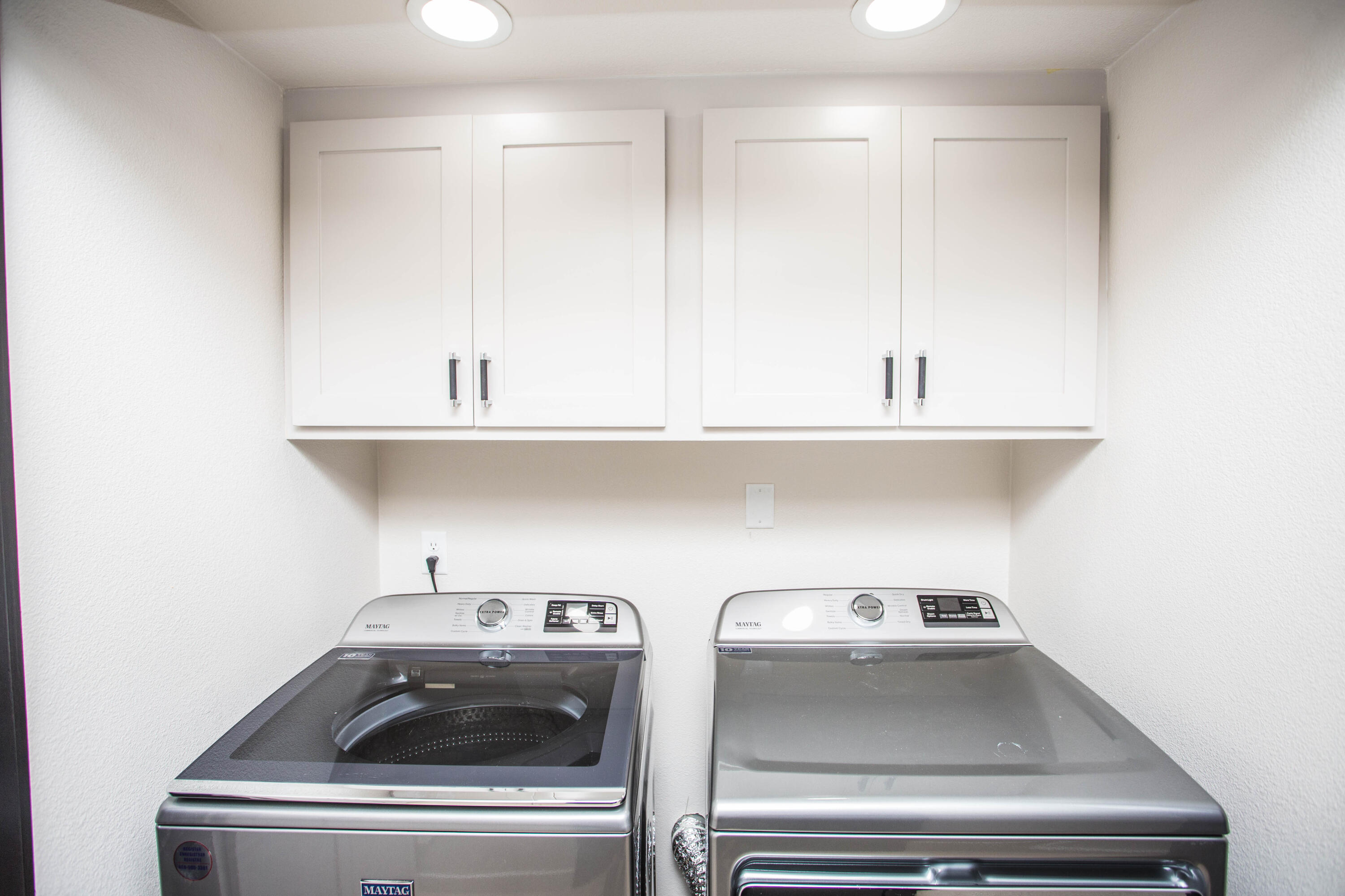 25 East Lakeshore Drive Ransom Canyon, TX 79366 - Photo 31 of 63 a bathroom with a sink and cabinets