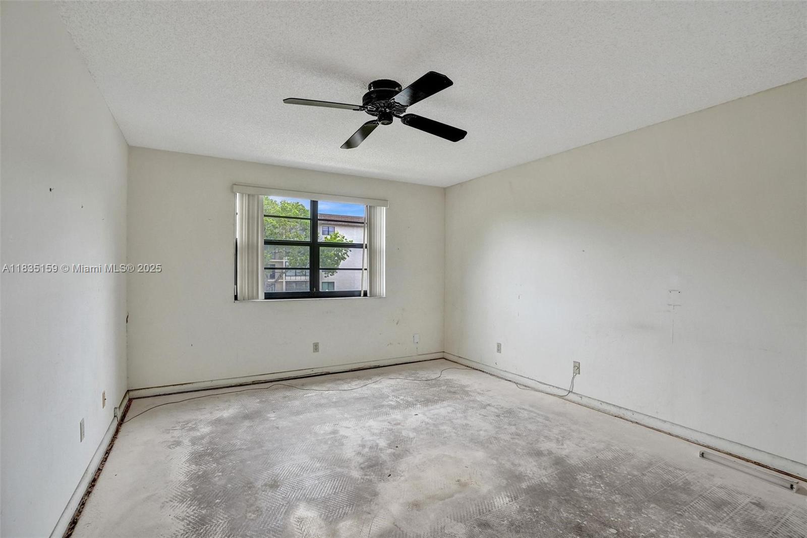 4965 East Sabal Palm Boulevard, Unit 207 Tamarac, FL 33319 - Photo 16 of 37 a view of an empty room