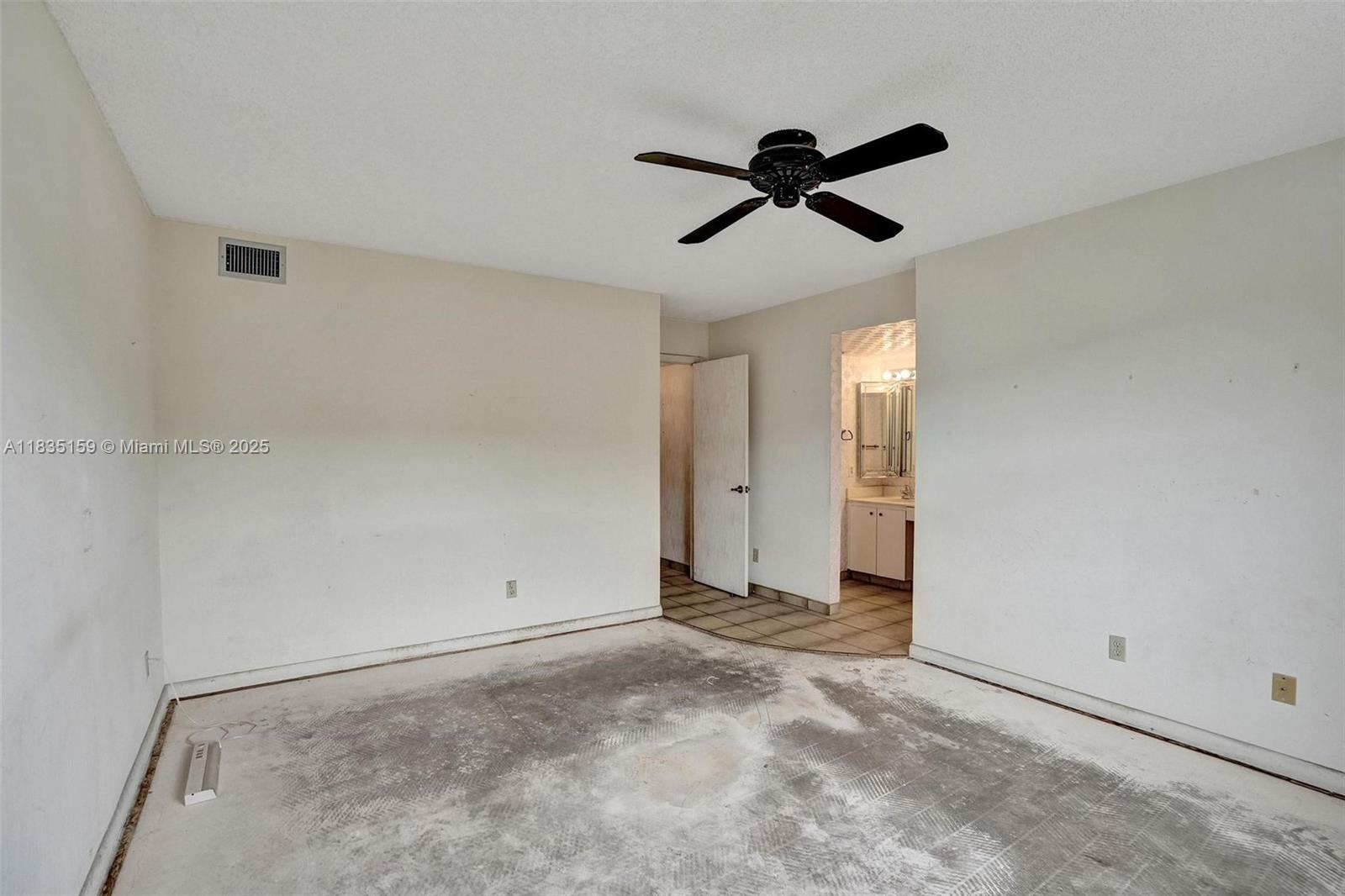 4965 East Sabal Palm Boulevard, Unit 207 Tamarac, FL 33319 - Photo 18 of 37 a view of an empty room