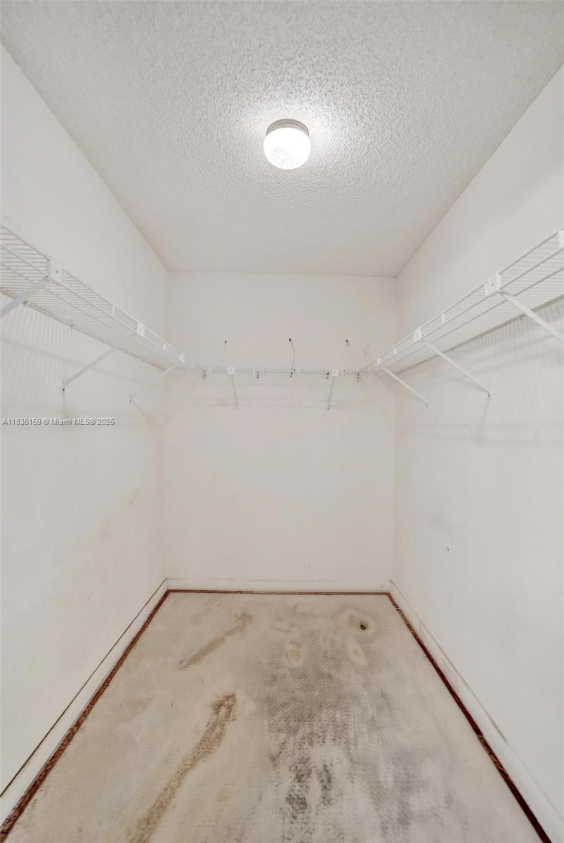 4965 East Sabal Palm Boulevard, Unit 207 Tamarac, FL 33319 - Photo 23 of 37 a view of an empty room