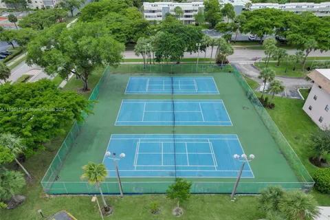 a view of a house with a big yard