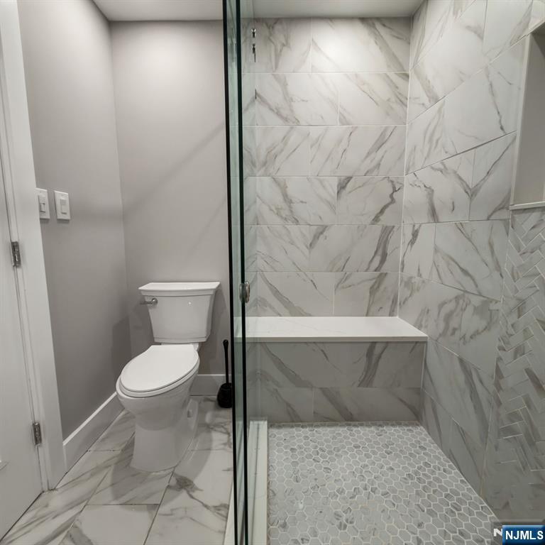 76 Mission Street Montclair, NJ 07042 - Photo 11 of 50 a bathroom with a toilet and a shower