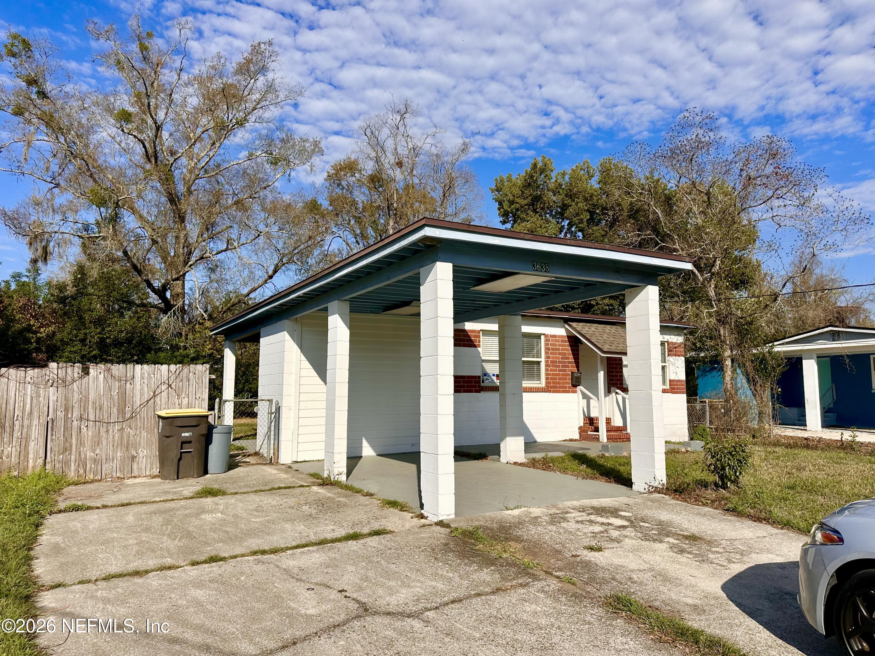 3638 Jammes Road Jacksonville, FL 32210 - Photo 3 of 31 a view of a house with a snow on the road