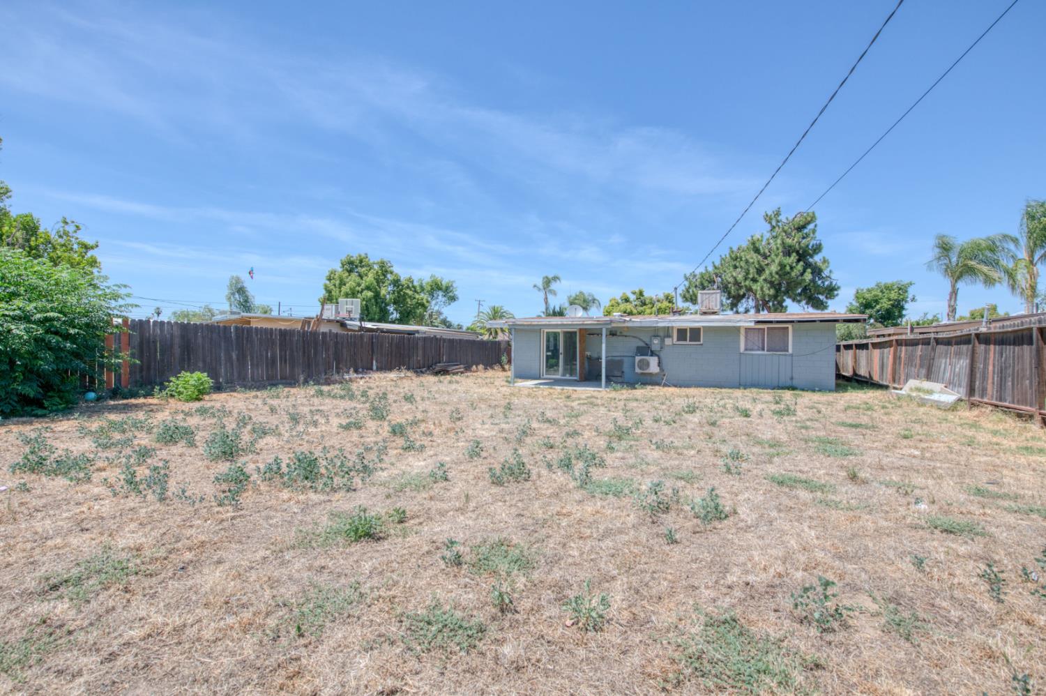 2326 East Hampton Way Fresno, CA 93726 - Photo 20 of 22 a view of a backyard