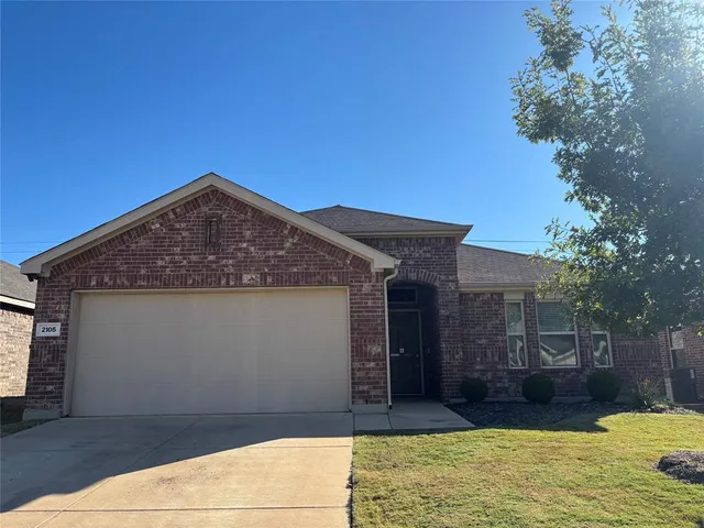 a view of a house with a swimming pool