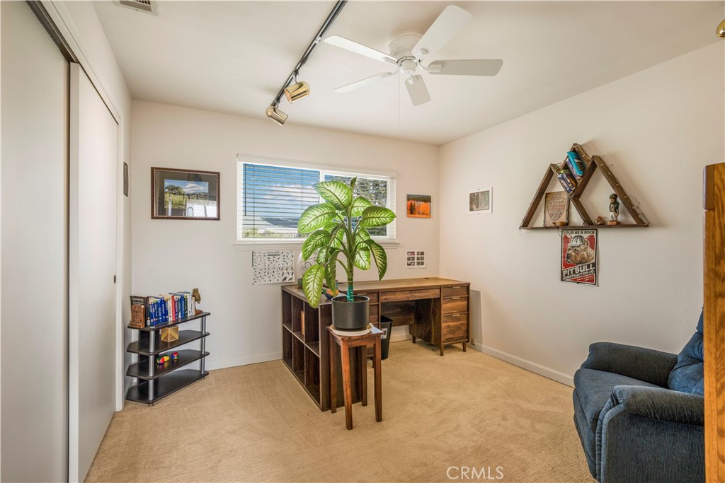 4648 Marlene Drive Santa Maria, CA 93455 - Photo 15 of 37 a room with furniture and a potted plant