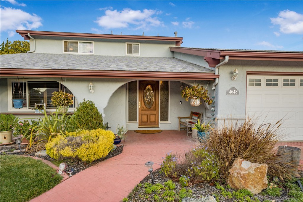4648 Marlene Drive Santa Maria, CA 93455 - Photo 2 of 37 a front view of a house with garden