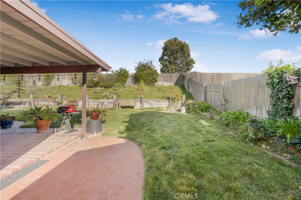 4648 Marlene Drive Santa Maria, CA 93455 - Photo 32 of 37 a view of a patio with table and chairs and potted plants