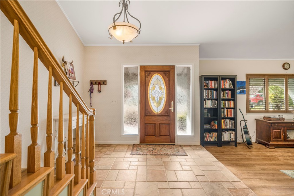 4648 Marlene Drive Santa Maria, CA 93455 - Photo 4 of 37 a view of an entryway with wooden floor and stairs
