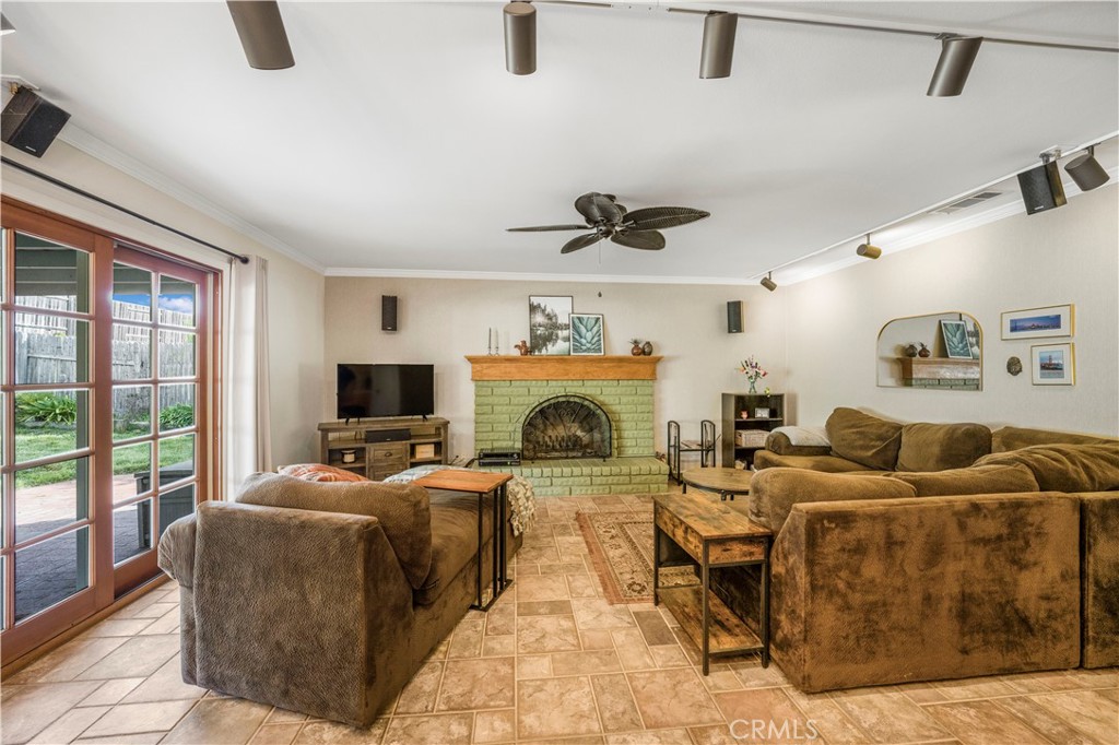 4648 Marlene Drive Santa Maria, CA 93455 - Photo 7 of 37 a living room with furniture and a fireplace