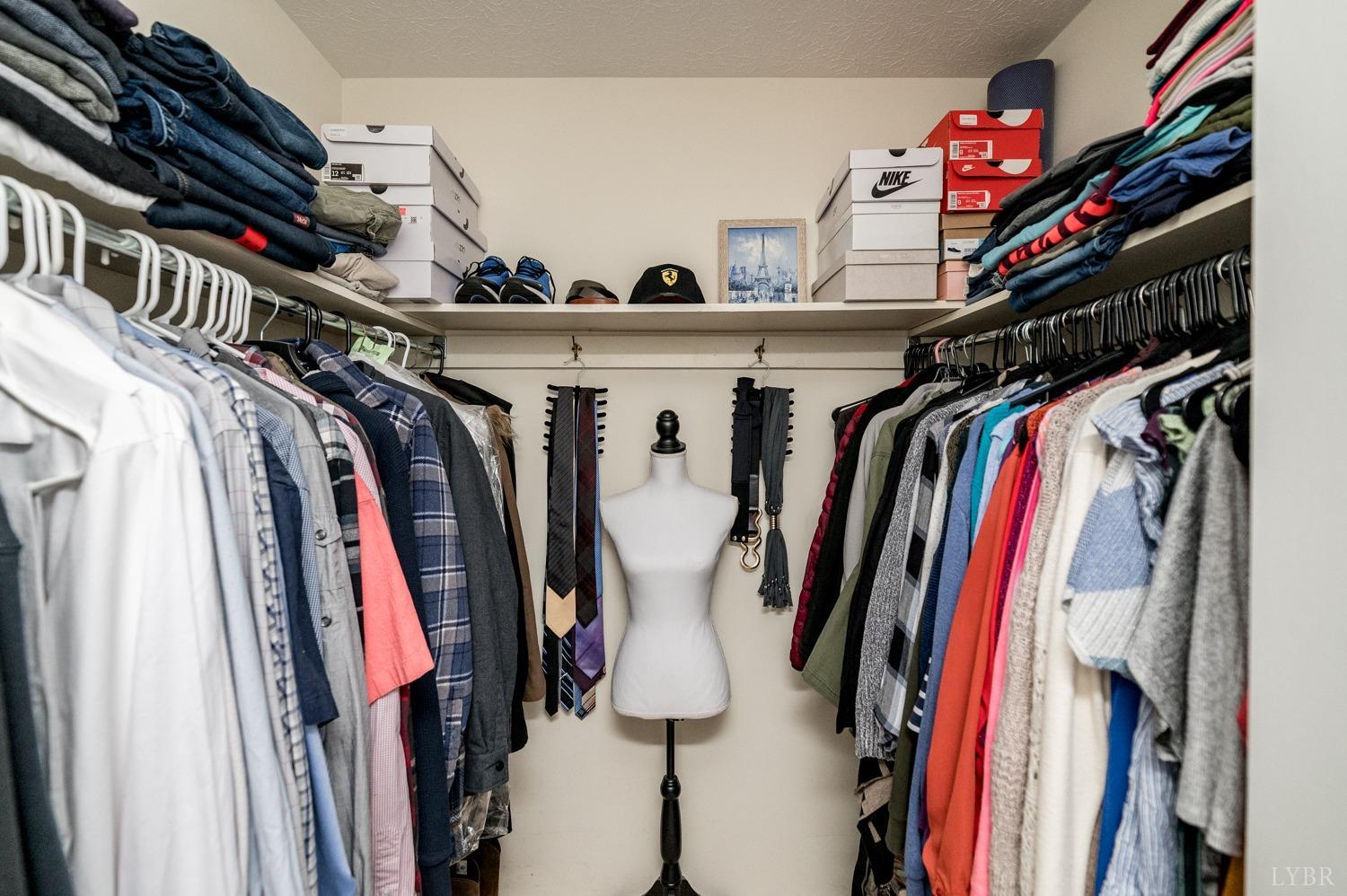 5335 Perrowville Road Forest, VA 24551 - Photo 50 of 65 a view of walk in closet with clothes and shoes