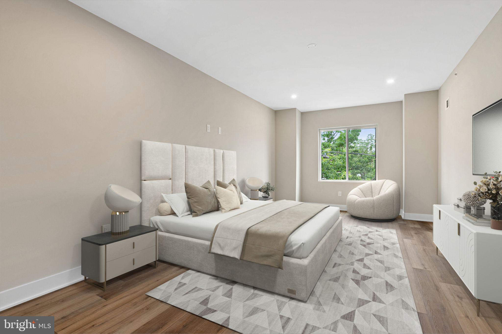 2722 Wharton Street Philadelphia, PA 19146 - Photo 16 of 46 a bedroom with a bed and a couch