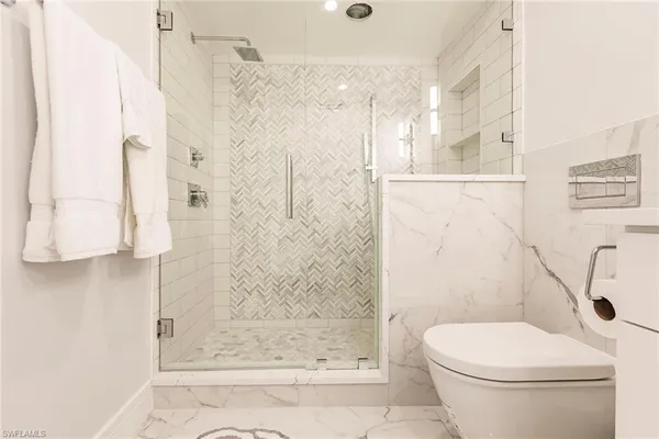 a view of a sink and a window