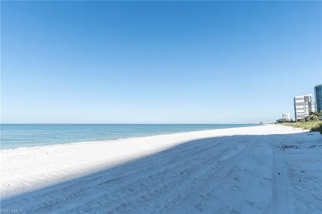 a view of a street with a building