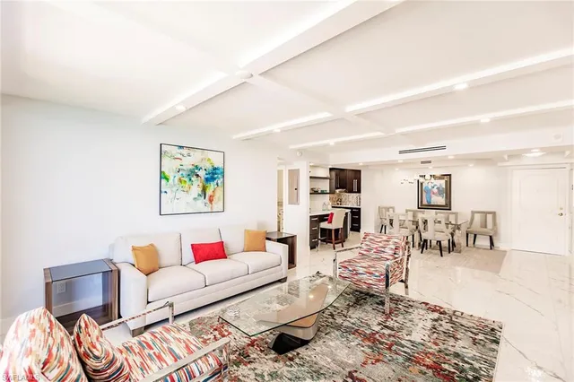 a living room with furniture and a couch