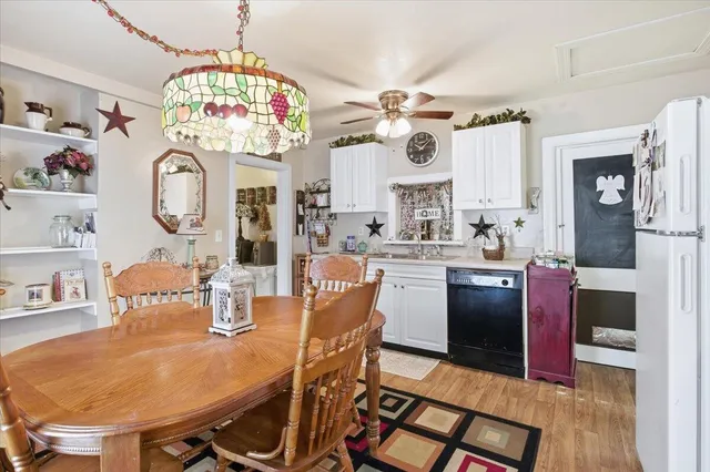 a kitchen with a table and chairs