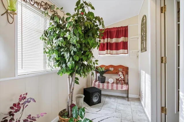 a backyard of a house with barbeque oven fire pit and outdoor seating