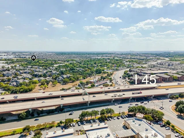 a view of a city with an ocean