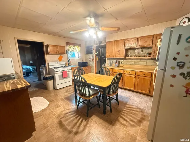 a view of a dining room with furniture