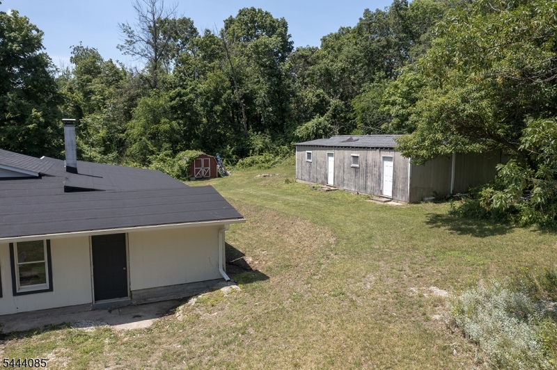 79 Lake Wallkill Road Vernon, NJ 07461 - Photo 24 of 27 a view of a house with a yard