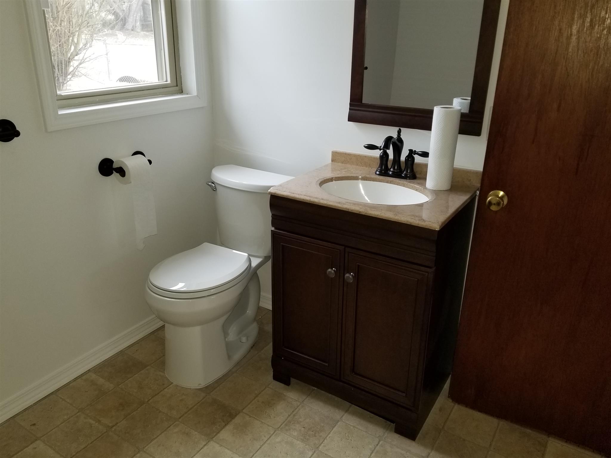 405 Burch Road Clarksville, TN 37042 - Photo 19 of 30 a bathroom with a sink and a toilet
