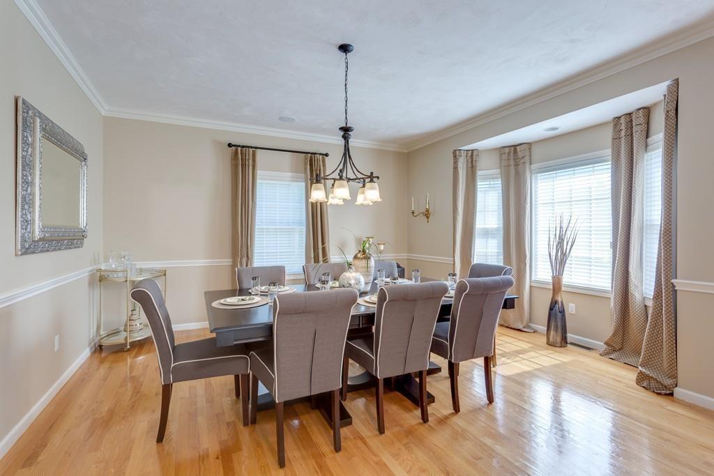 64 Aspen Road Sharon, MA 02067 - Photo 4 of 42 a view of a dining room with furniture window and wooden floor