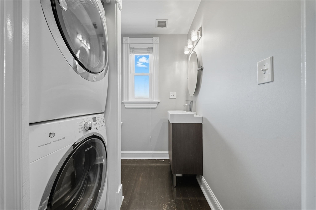 22 Trescott Street, Unit 3 Boston, MA 02125 - Photo 12 of 22 a utility room with dryer and washer