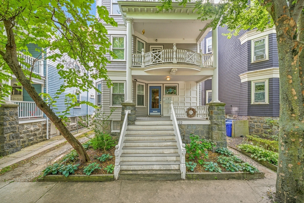 22 Trescott Street, Unit 3 Boston, MA 02125 - Photo 22 of 22 a front view of a house with a yard