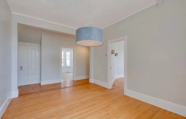 a view of an empty room and window