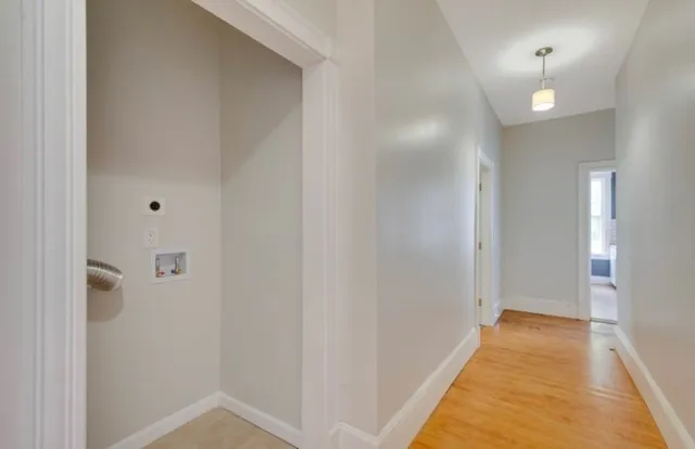 a view of a bathroom from the hallway