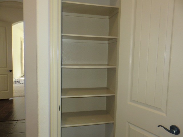 2607 Alan Lake Lane Spring, TX 77388 - Photo 21 of 42 a view of walk in closet with empty racks