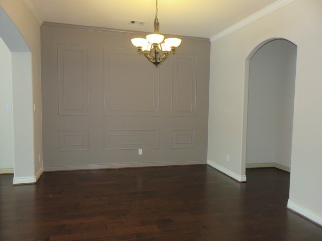 2607 Alan Lake Lane Spring, TX 77388 - Photo 10 of 42 a view of a room with wooden floor and chandelier