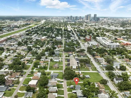 an aerial view of residential houses with outdoor space