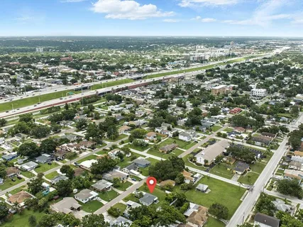 an aerial view of a city with lots of residential buildings