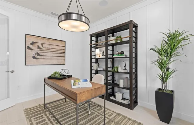 a kitchen with stainless steel appliances granite countertop a sink a stove and a wooden floors