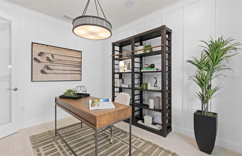 6249 Dew Drop Loop St. Cloud, FL 34771 - Photo 5 of 26 a living room with furniture and a potted plant