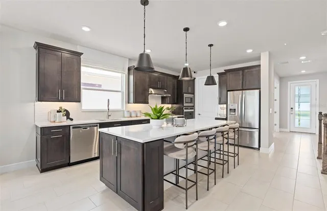a view of a dining room with furniture
