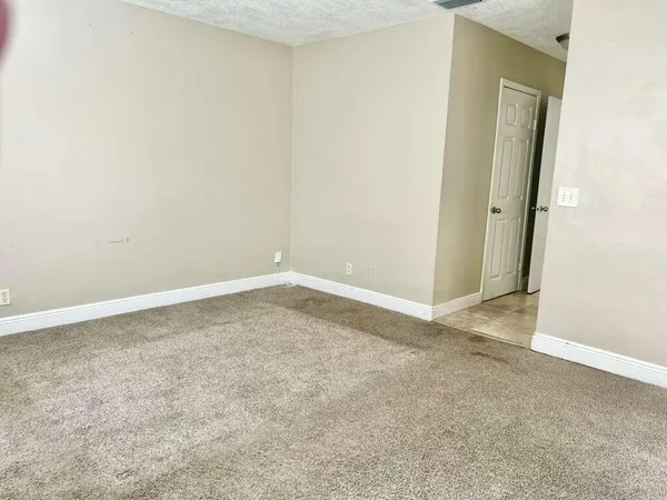 an empty room with a natural light