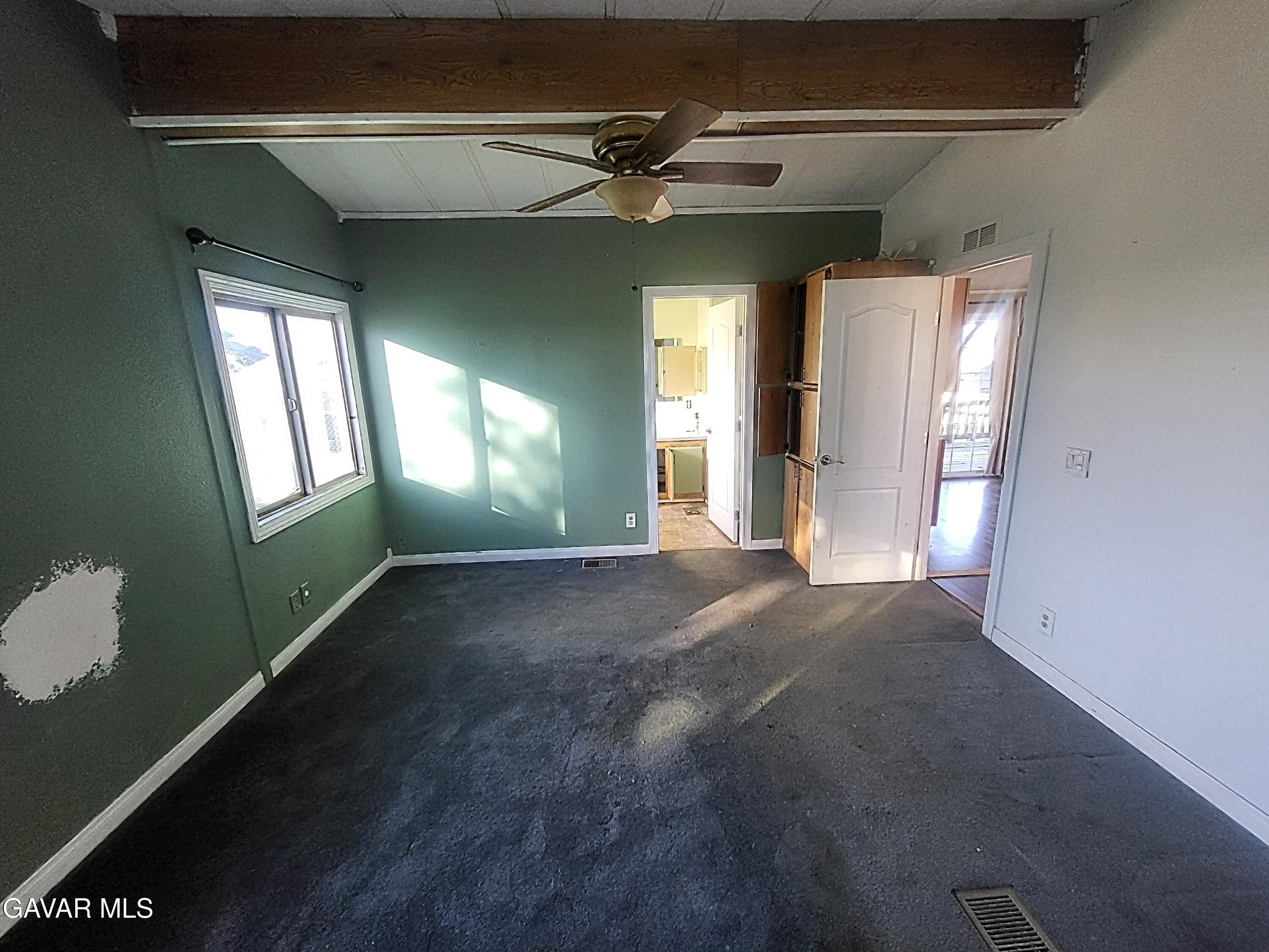 8667 70th Street West Mojave, CA 93501 - Photo 2 of 32 a view of a livingroom with a fireplace