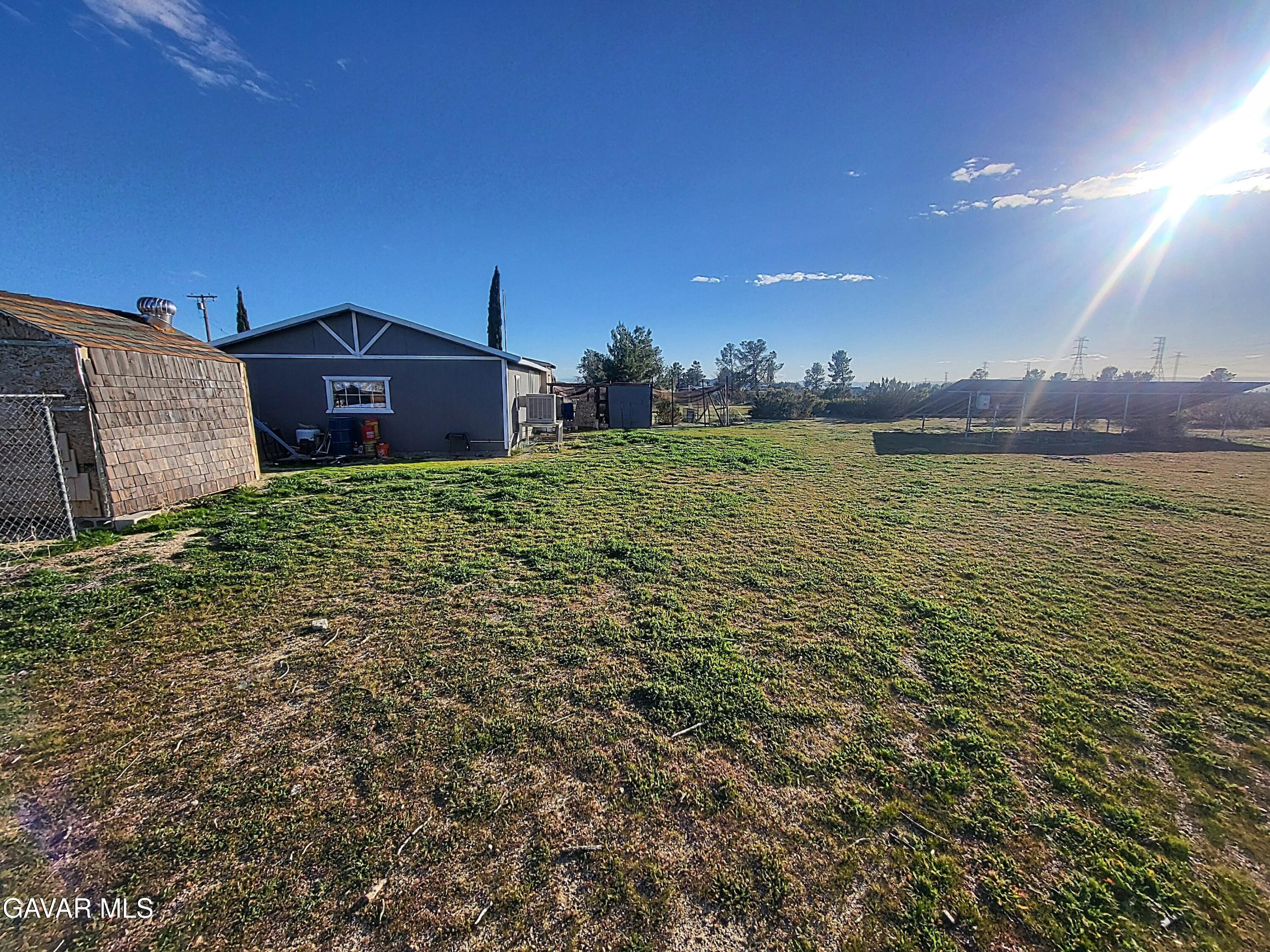 8667 70th Street West Mojave, CA 93501 - Photo 28 of 32 a view of a terrace with a lake
