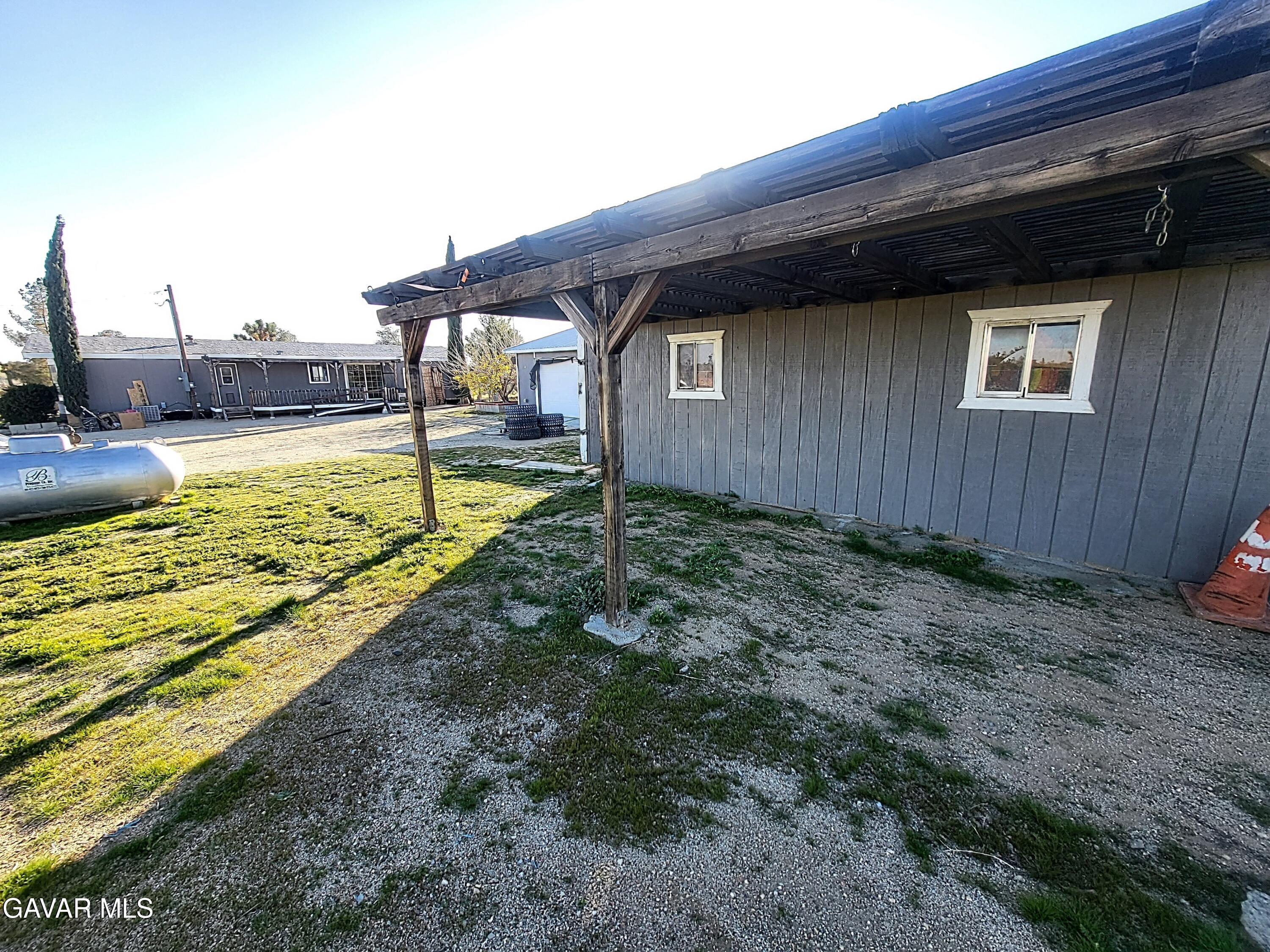 8667 70th Street West Mojave, CA 93501 - Photo 30 of 32 a view of a backyard