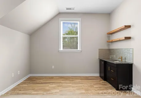 a view of swimming pool with a patio